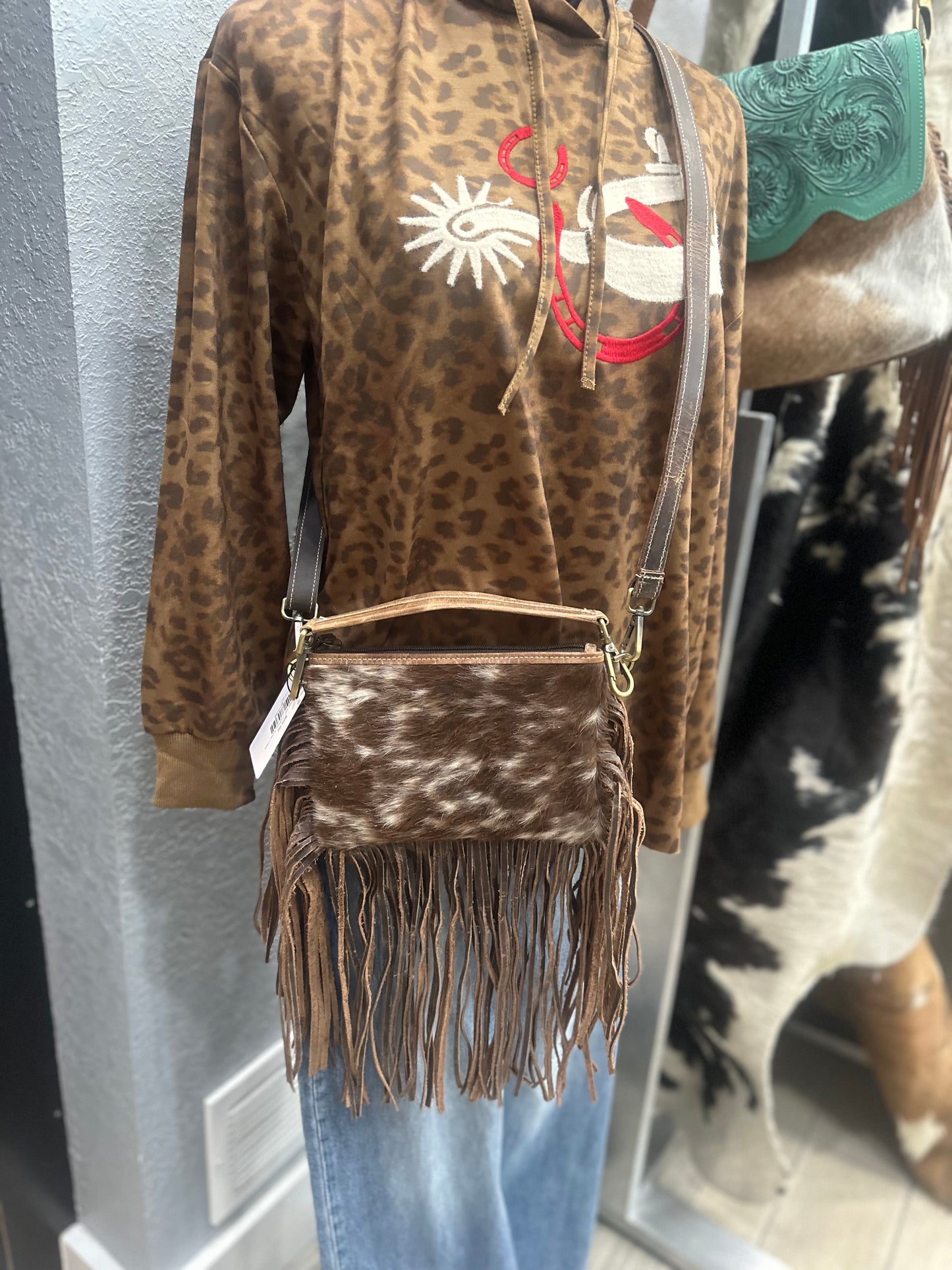 The Brown Cowhide and Fringe Purse
