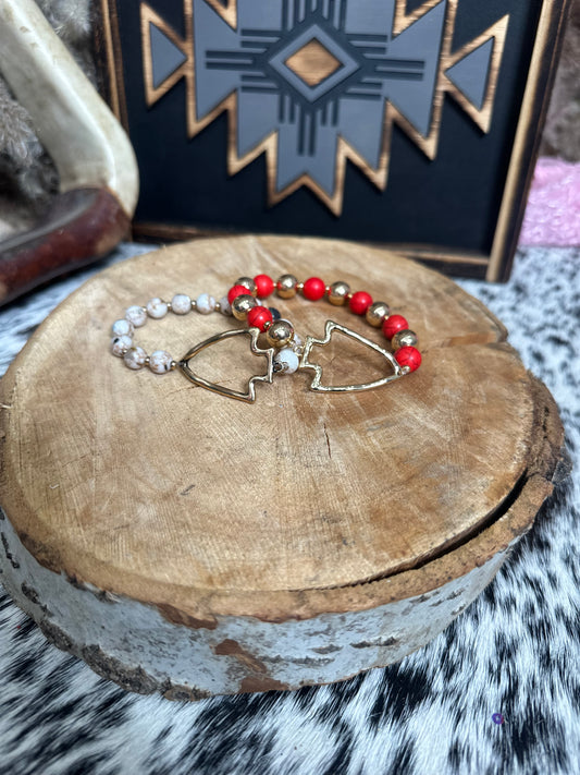 The Gold Arrowhead Braclets